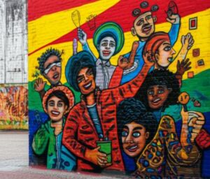 Arte de grafite colorida celebrando a diversidade cultural brasileira, apresentando um grupo de indivíduos diversos em uma composição harmoniosa.
